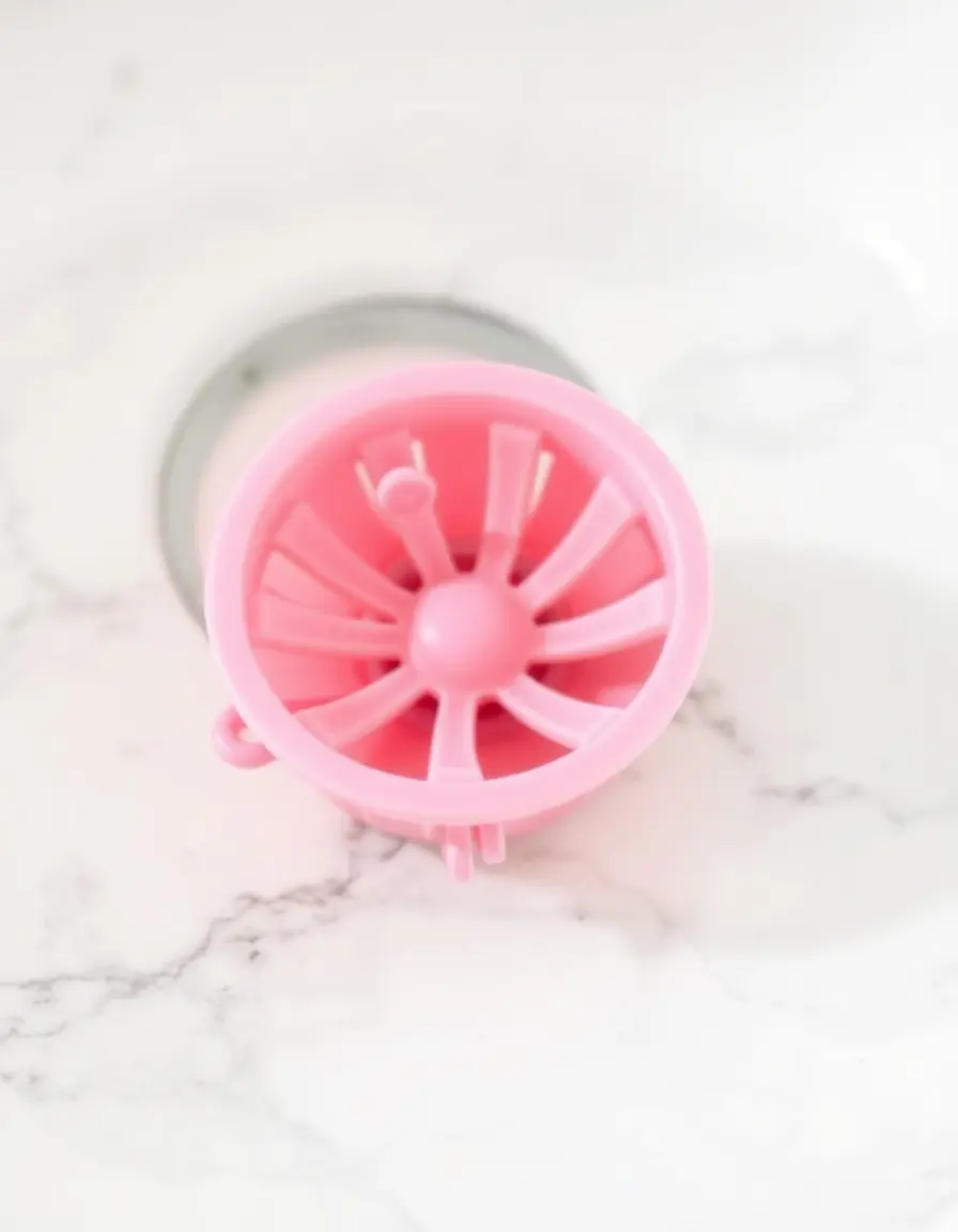 Attrape-cheveux et débris d'évier en silicone rose