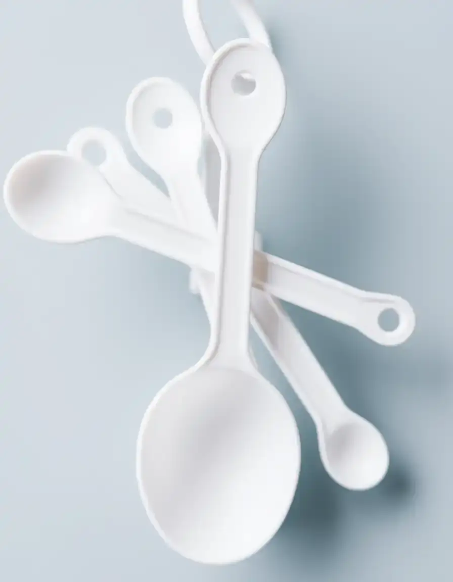 Cuillères doseuses blanches minimalistes