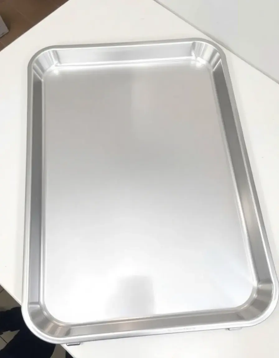 Plaque de cuisson en aluminium à bords relevés